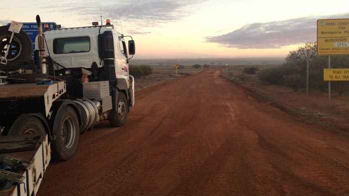 Image of the low loader going country