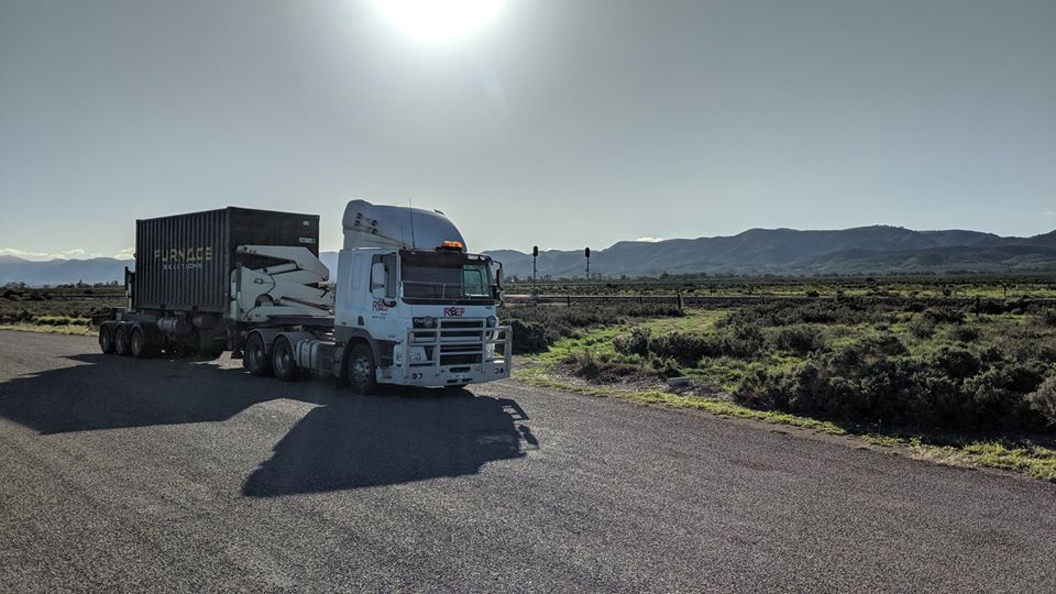 Transporting heavy load with trucks in Western Australia